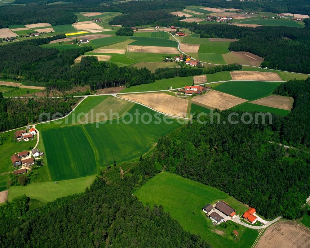 Aerial image Stockham - Homestead and farm outbuildings on the edge of agricultural fields in Stockham in the state Bavaria, Germany