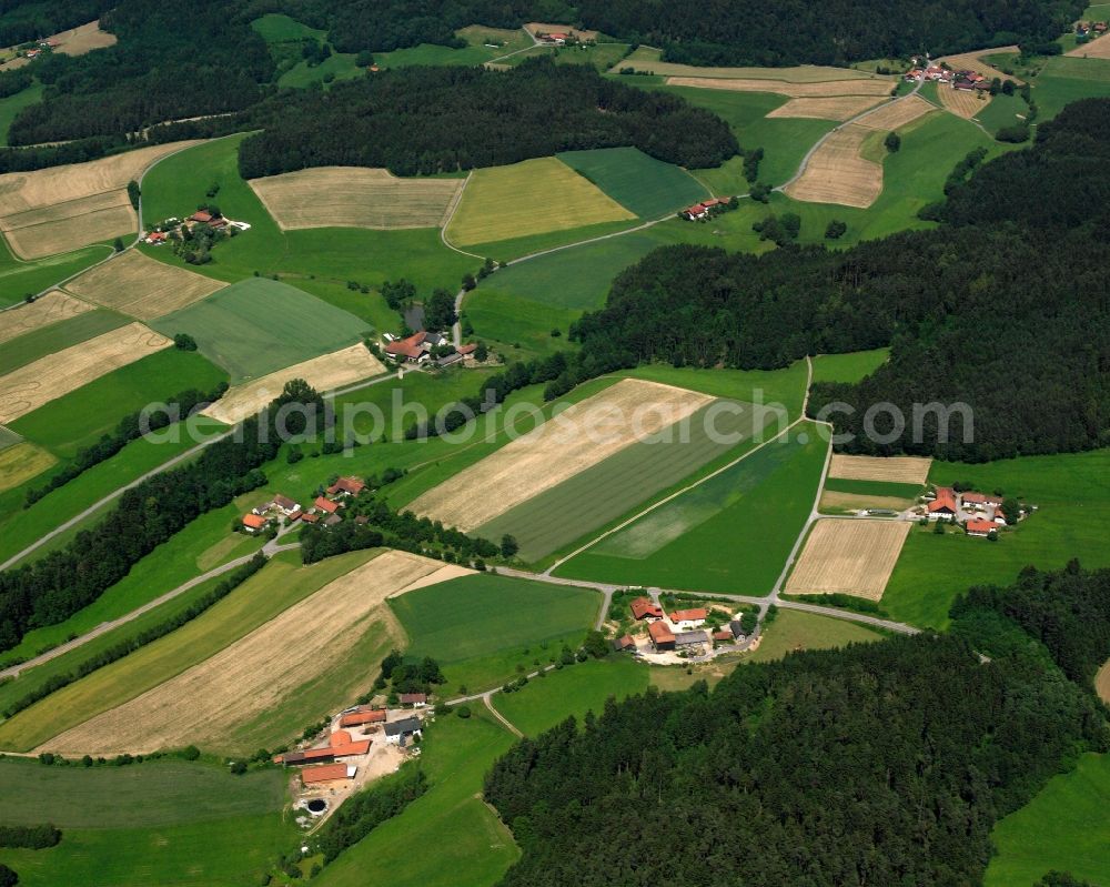 Untermannbach from the bird's eye view: Homestead and farm outbuildings on the edge of agricultural fields in Untermannbach in the state Bavaria, Germany