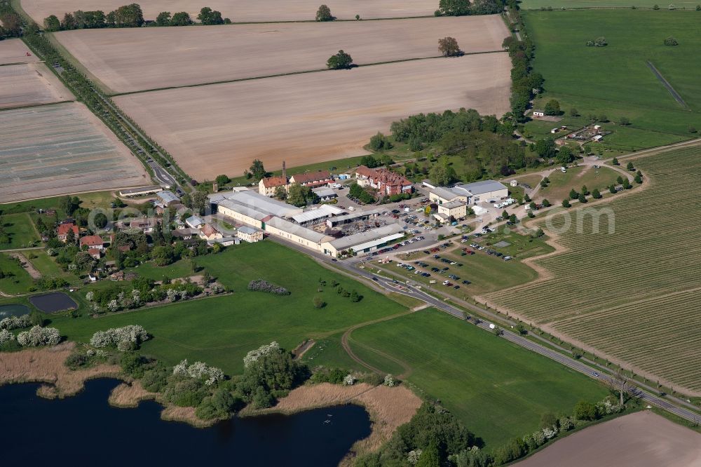 Aerial photograph Beetzseeheide - Homestead of a farm Vielfruchthof Domstiftsgut Moetzow in Beetzseeheide in the state Brandenburg with fields, Germany