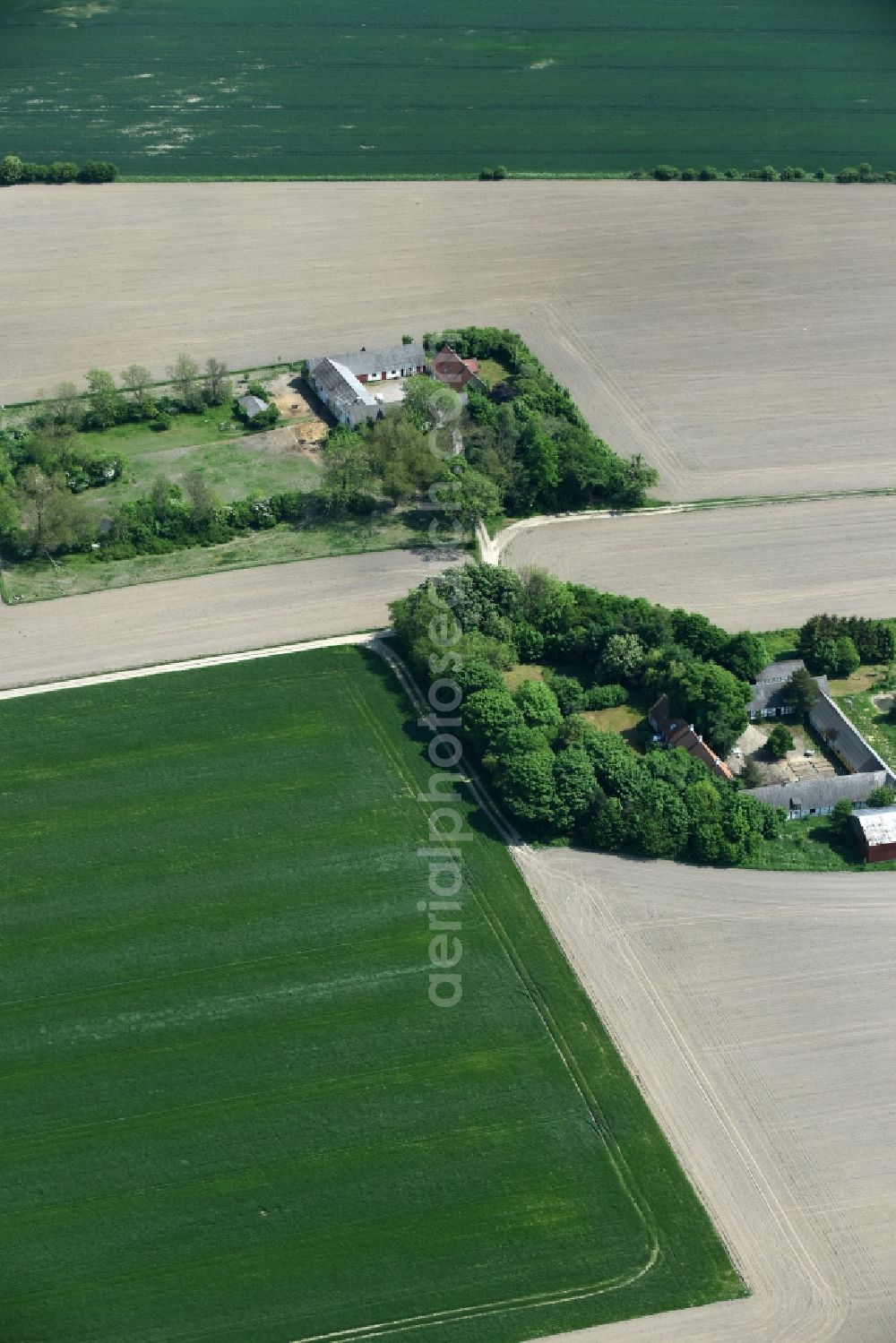 Aerial image Aakirkeby - Farm on the edge of cultivated fields in Aakirkeby Bornholm Island in Region Hovedstaden, Denmark