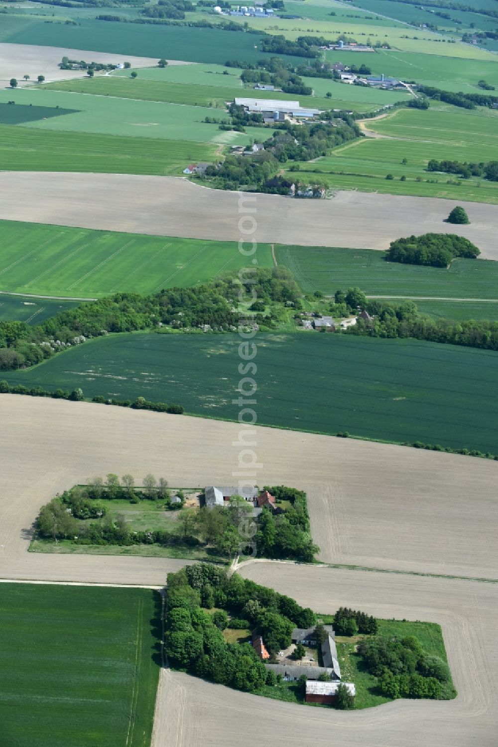 Aakirkeby from above - Farm on the edge of cultivated fields in Aakirkeby Bornholm Island in Region Hovedstaden, Denmark