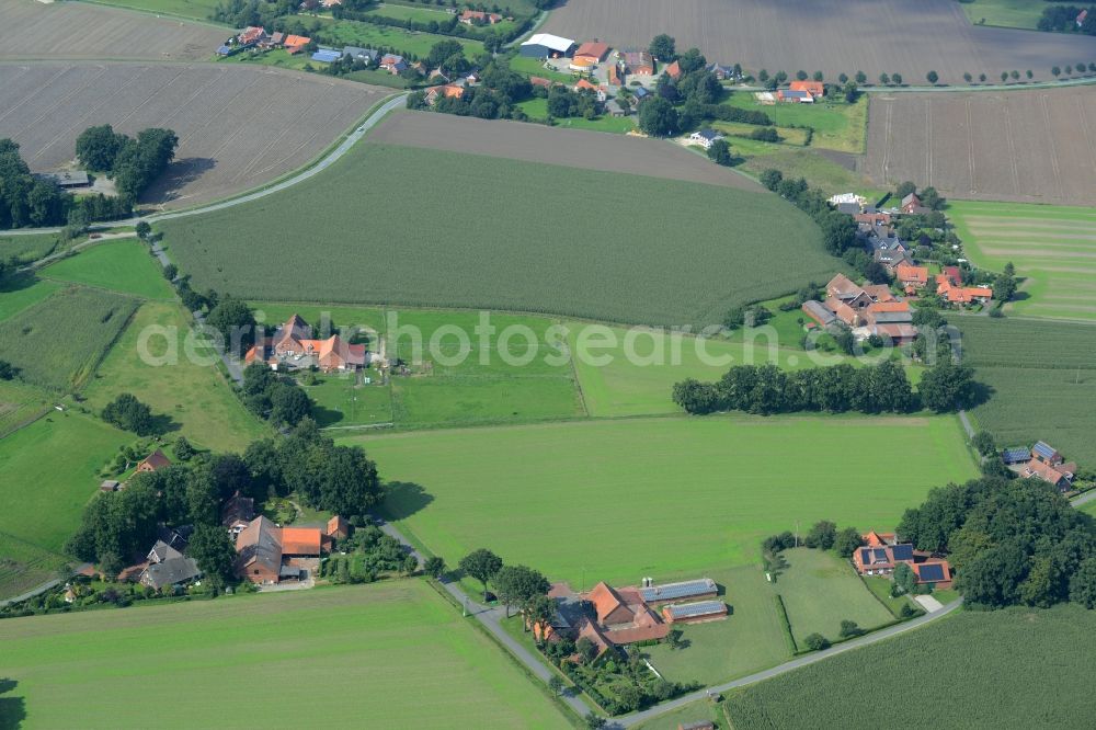 Aerial photograph Alfhausen - Farm on the edge of cultivated fields in Alfhausen in the state Lower Saxony