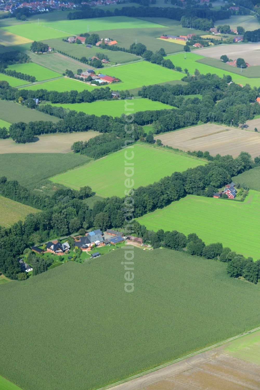 Aerial photograph Alfhausen - Farm on the edge of cultivated fields in Alfhausen in the state Lower Saxony