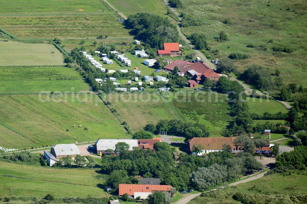 Borkum from above - Farm on the edge of cultivated green fields with campground in Borkum in the state Lower Saxony