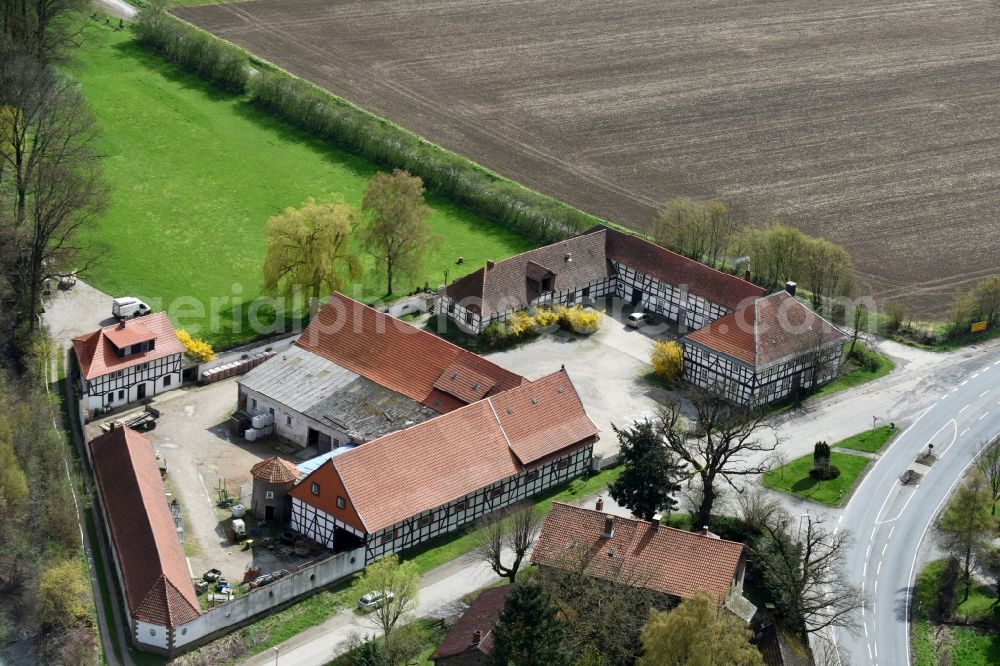 Hahausen from above - Farm on the edge of cultivated fields in Hahausen in the state Lower Saxony