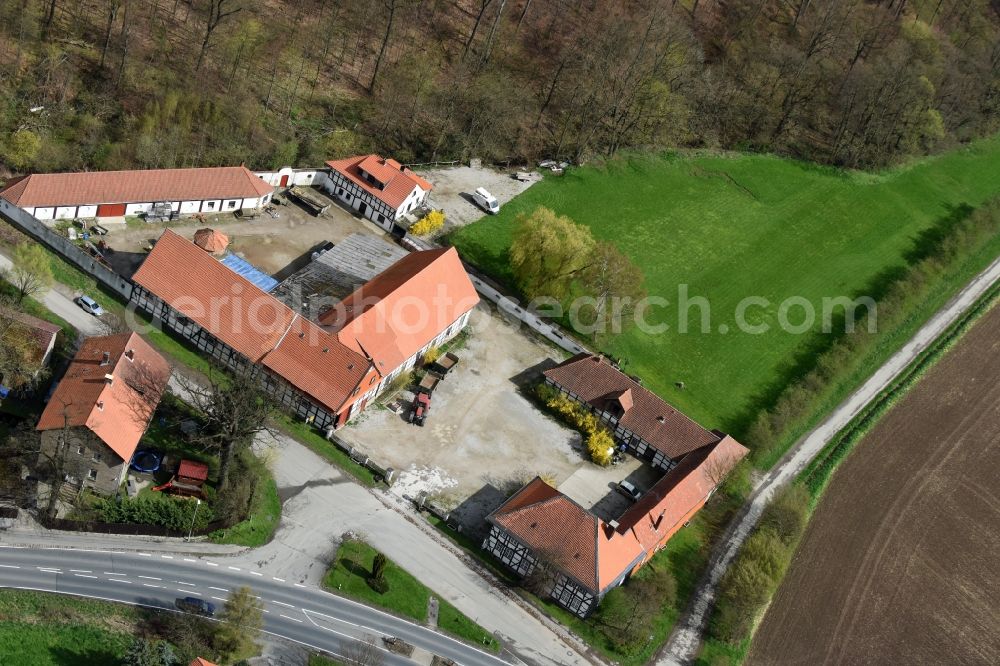 Hahausen from above - Farm on the edge of cultivated fields in Hahausen in the state Lower Saxony