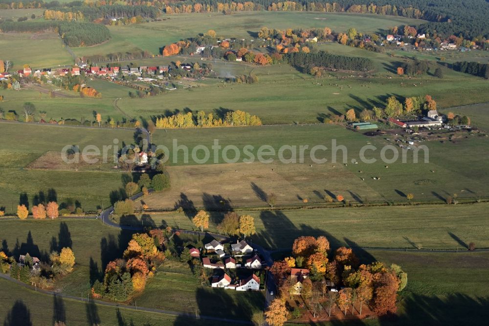 Neu Hartmannsdorf from the bird's eye view: Farm on the edge of cultivated fields in Neu Hartmannsdorf in the state Brandenburg