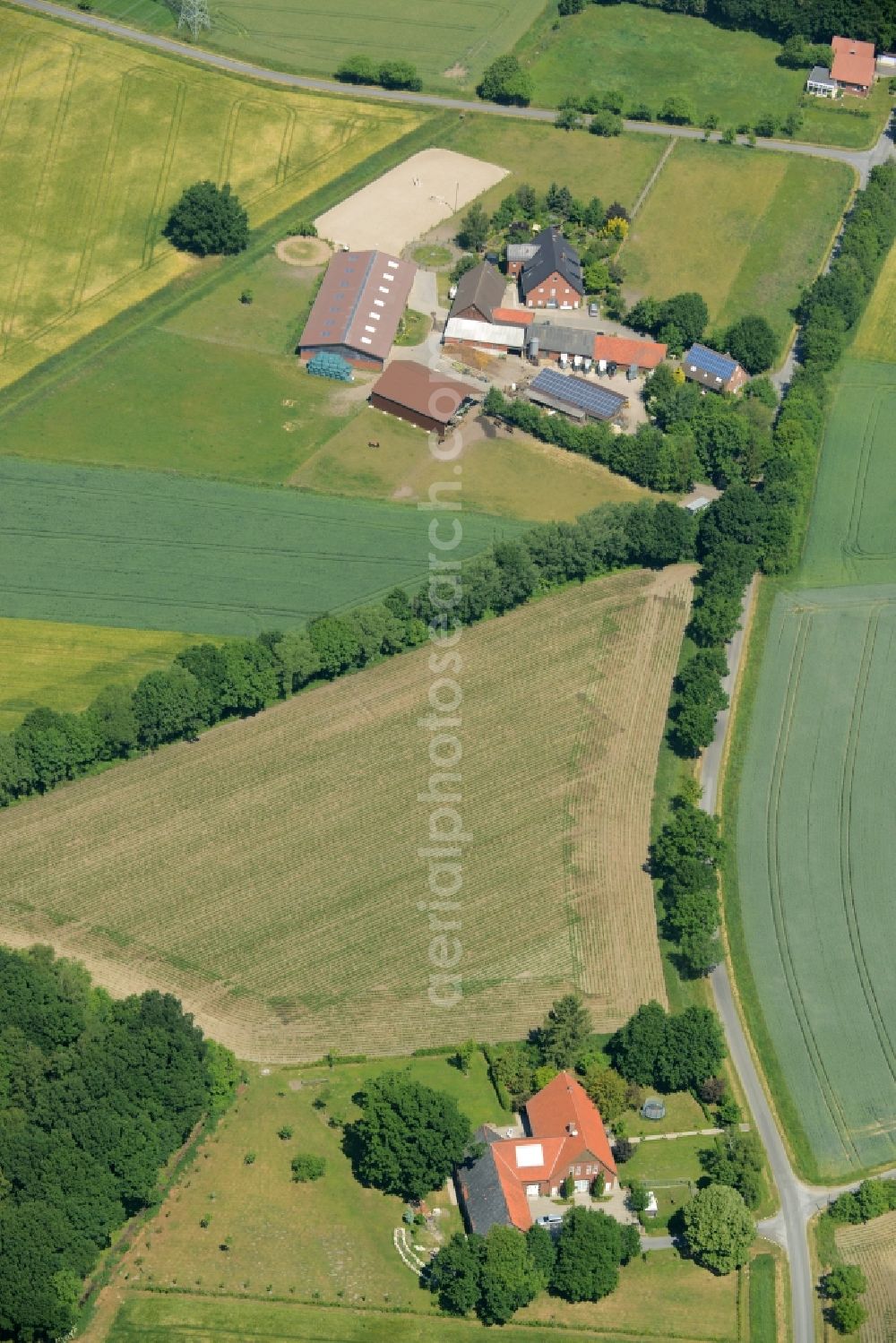 Aerial image Oelde - Farm on the edge of cultivated fields in Oelde in the state North Rhine-Westphalia