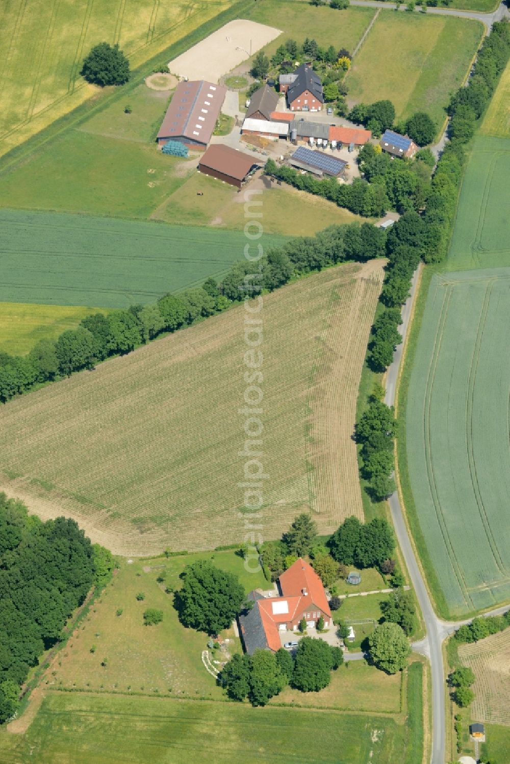 Aerial photograph Oelde - Farm on the edge of cultivated fields in Oelde in the state North Rhine-Westphalia