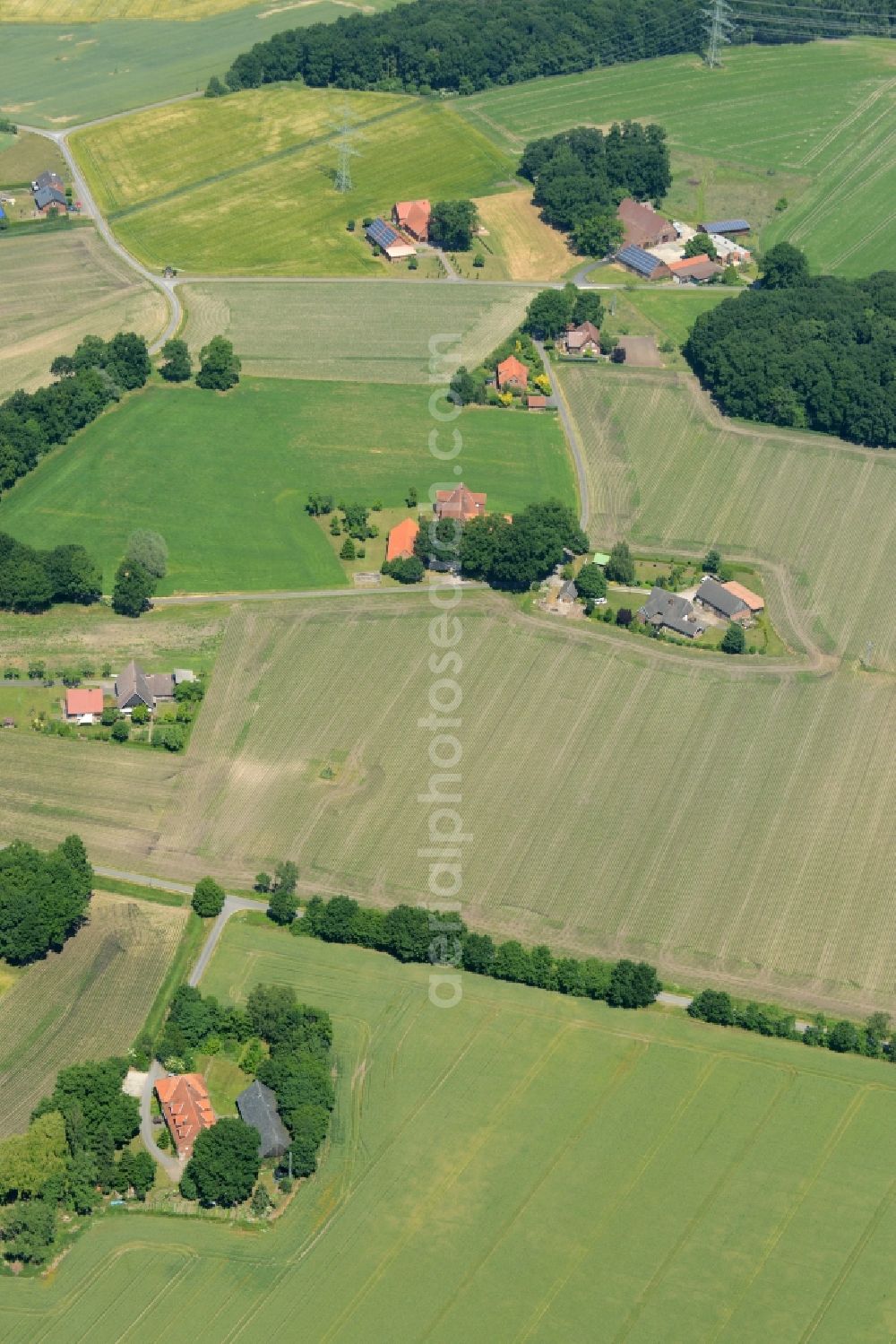 Aerial image Oelde - Farm on the edge of cultivated fields in Oelde in the state North Rhine-Westphalia