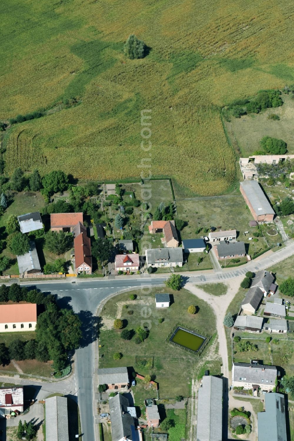 Aerial photograph Parmen Nordwestuckermark - Farm on the edge of cultivated fields in Parmen - Nordwestuckermark in the state Brandenburg