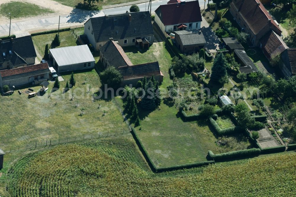 Parmen Nordwestuckermark from the bird's eye view: Farm on the edge of cultivated fields in Parmen - Nordwestuckermark in the state Brandenburg