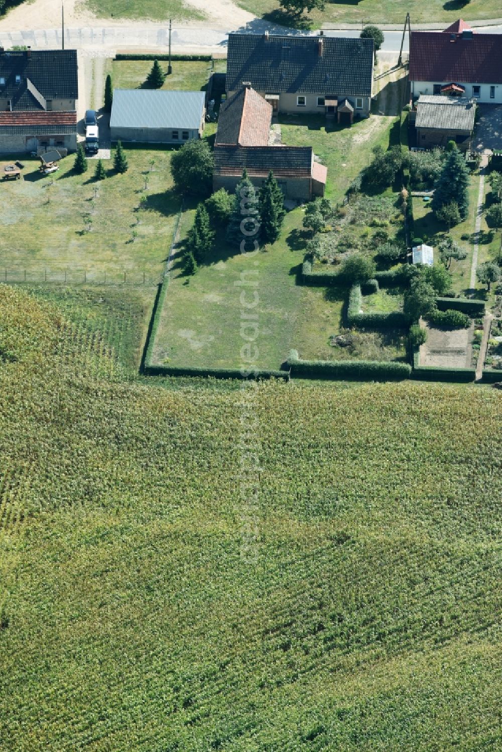 Parmen Nordwestuckermark from above - Farm on the edge of cultivated fields in Parmen - Nordwestuckermark in the state Brandenburg