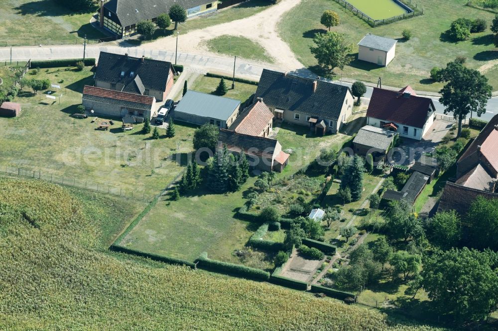 Parmen Nordwestuckermark from the bird's eye view: Farm on the edge of cultivated fields in Parmen - Nordwestuckermark in the state Brandenburg