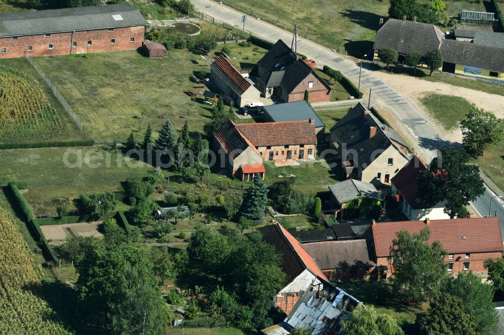 Aerial image Parmen Nordwestuckermark - Farm on the edge of cultivated fields in Parmen - Nordwestuckermark in the state Brandenburg