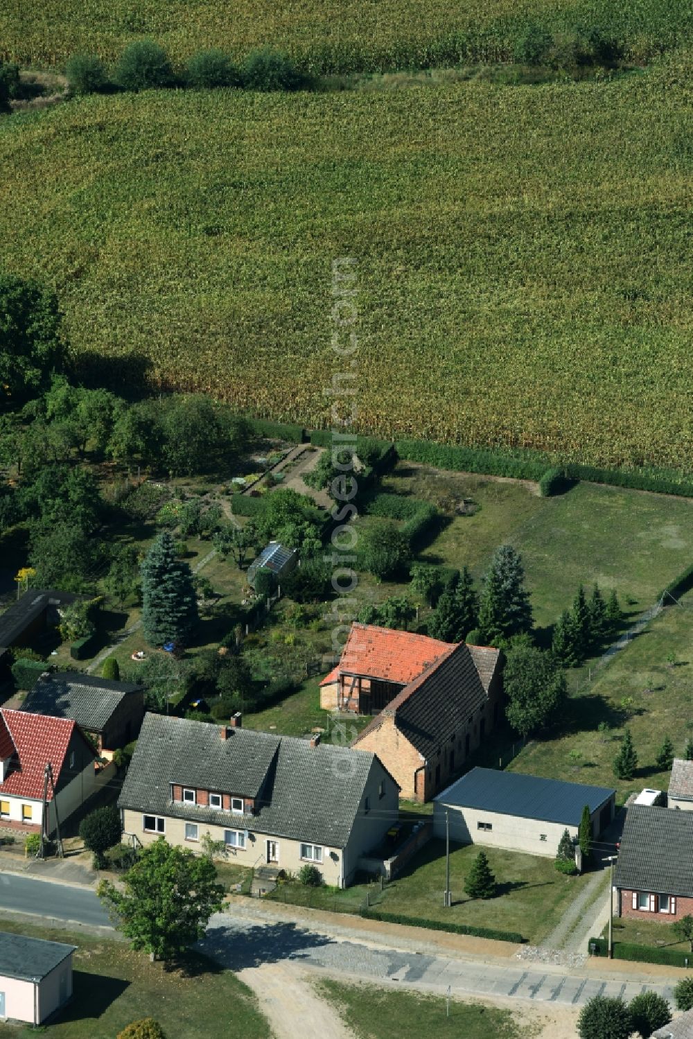 Aerial image Parmen Nordwestuckermark - Farm on the edge of cultivated fields in Parmen - Nordwestuckermark in the state Brandenburg