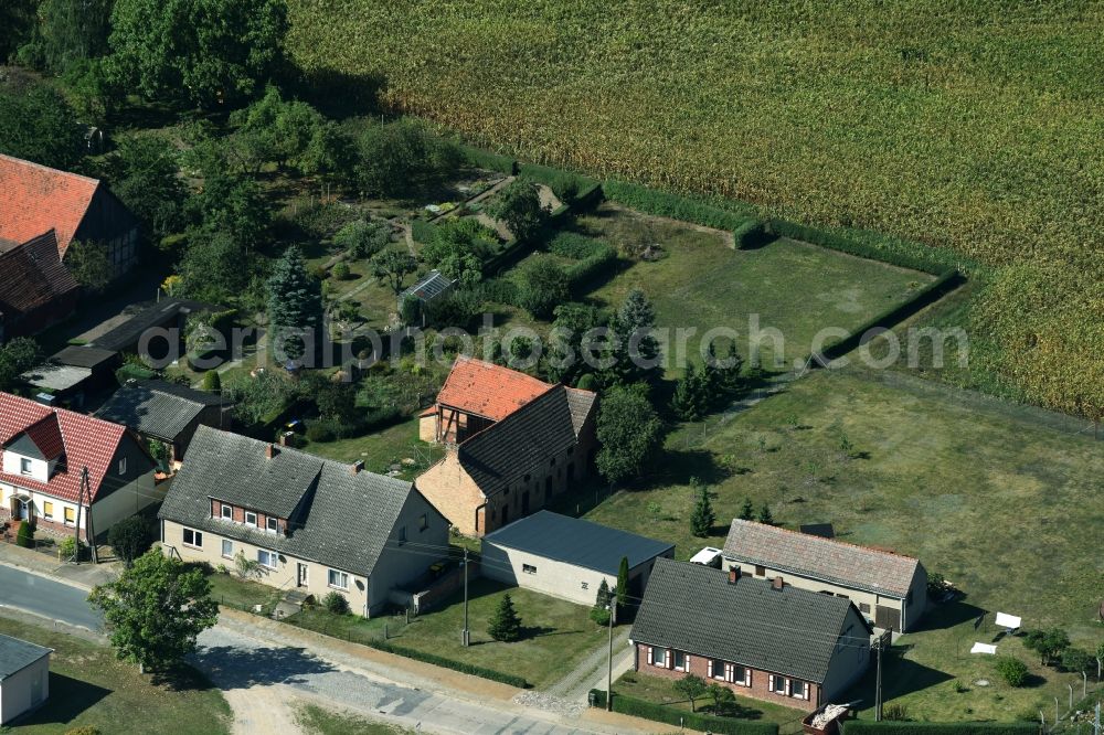 Aerial photograph Parmen Nordwestuckermark - Farm on the edge of cultivated fields in Parmen - Nordwestuckermark in the state Brandenburg