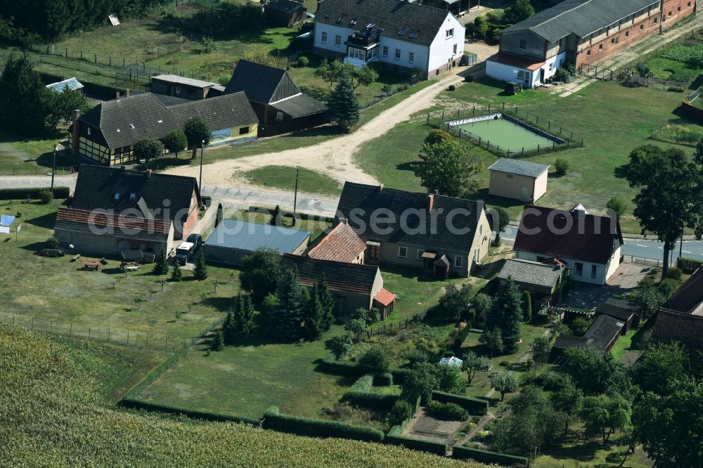 Parmen Nordwestuckermark from the bird's eye view: Farm on the edge of cultivated fields in Parmen - Nordwestuckermark in the state Brandenburg