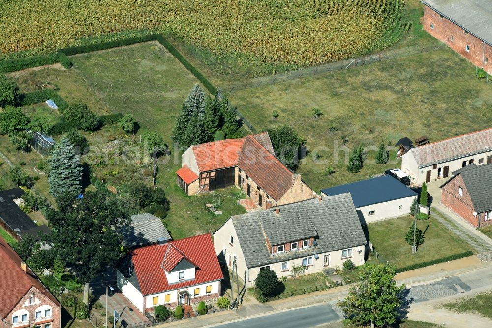 Parmen Nordwestuckermark from the bird's eye view: Farm on the edge of cultivated fields in Parmen - Nordwestuckermark in the state Brandenburg