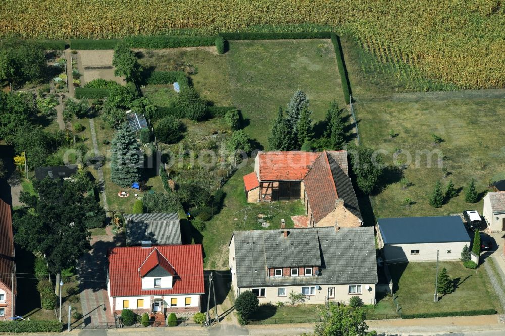 Aerial image Parmen Nordwestuckermark - Farm on the edge of cultivated fields in Parmen - Nordwestuckermark in the state Brandenburg