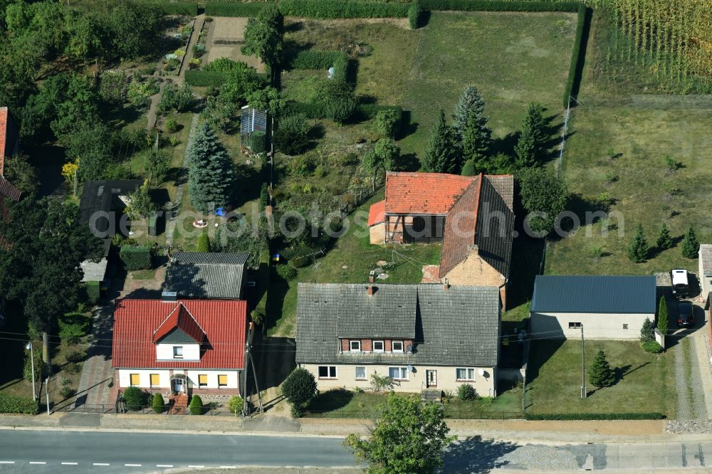 Aerial photograph Parmen Nordwestuckermark - Farm on the edge of cultivated fields in Parmen - Nordwestuckermark in the state Brandenburg