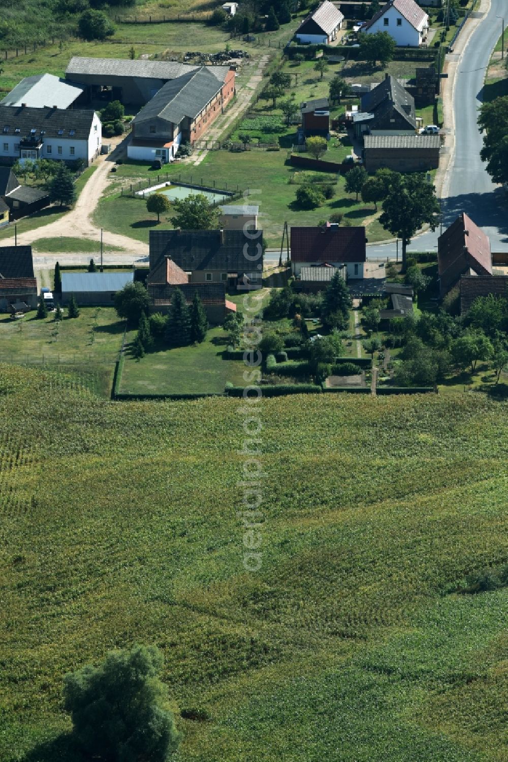 Aerial image Parmen Nordwestuckermark - Farm on the edge of cultivated fields in Parmen - Nordwestuckermark in the state Brandenburg