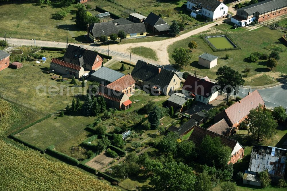 Aerial photograph Parmen Nordwestuckermark - Farm on the edge of cultivated fields in Parmen - Nordwestuckermark in the state Brandenburg