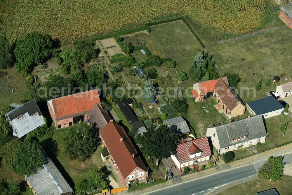 Aerial photograph Parmen Nordwestuckermark - Farm on the edge of cultivated fields in Parmen - Nordwestuckermark in the state Brandenburg