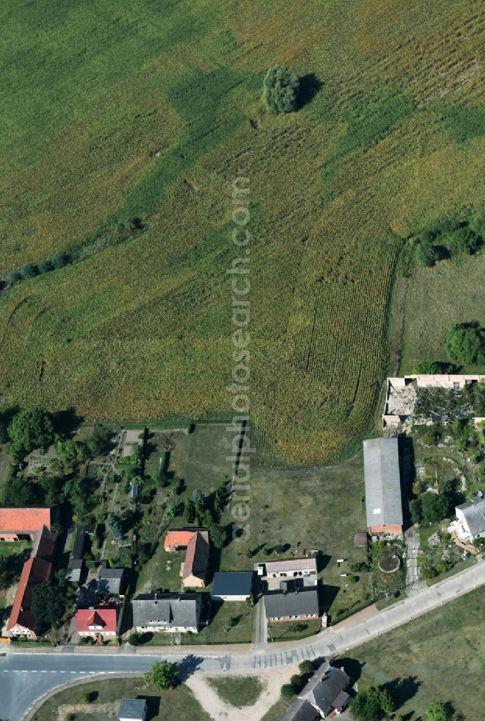 Aerial image Parmen Nordwestuckermark - Farm on the edge of cultivated fields in Parmen - Nordwestuckermark in the state Brandenburg