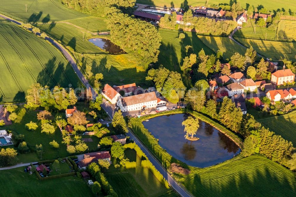 Aerial image Geiselwind - Manson at the Shore areas of the ponds in the district Rehweiler in Geiselwind in the state Bavaria, Germany