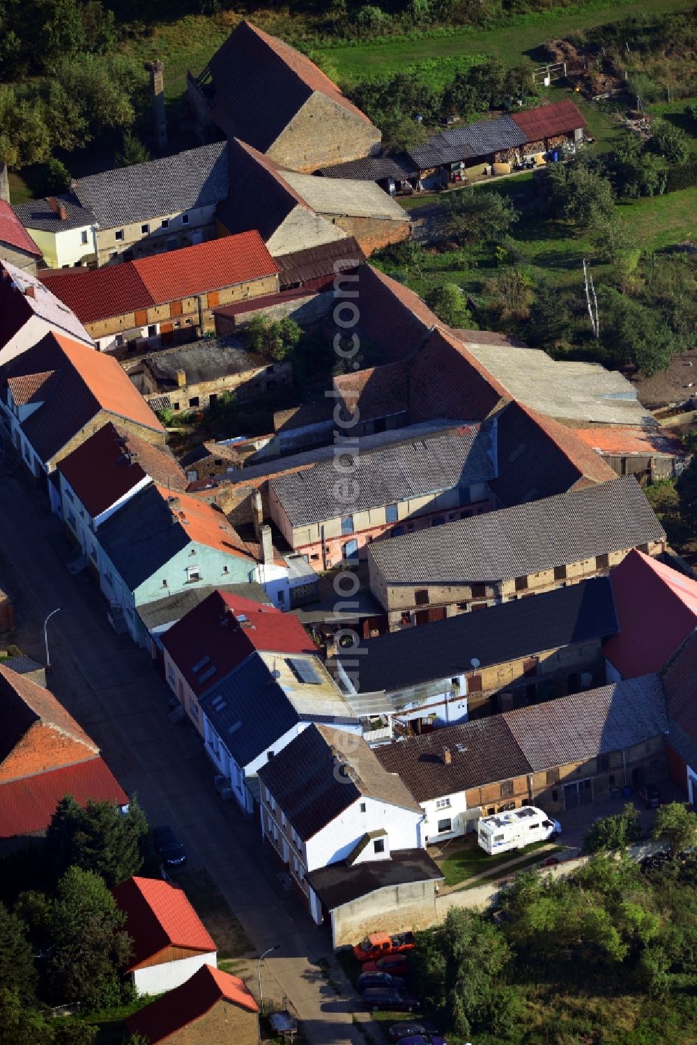 Wollin from the bird's eye view: Farms in Wollin in Brandenburg