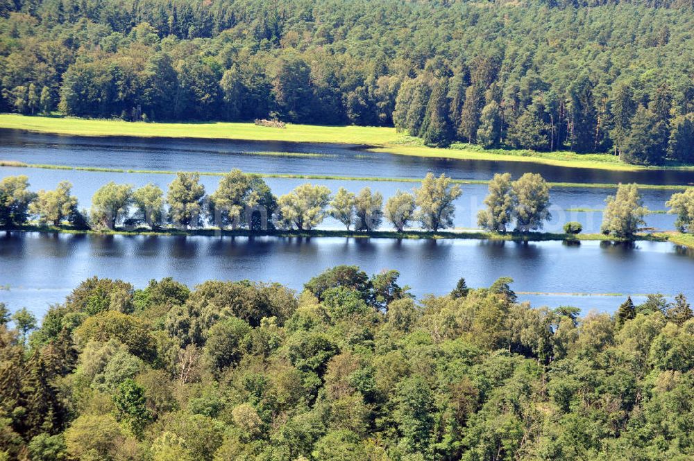 Gelbensande from the bird's eye view: Der, durch überdurchschnittlichen Regen und Grundwassereinfluß überflutete, Gelbensan der Forst, ein küstennahes Waldgebiet mit Mooren und Torfstichen in Mecklenburg-Vorpommern. Flooded landscape conservation area Gelbensan der Forst in Mecklenburg-Western Pomerania.