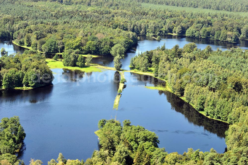 Gelbensande from the bird's eye view: Der, durch überdurchschnittlichen Regen und Grundwassereinfluß überflutete, Gelbensan der Forst, ein küstennahes Waldgebiet mit Mooren und Torfstichen in Mecklenburg-Vorpommern. Flooded landscape conservation area Gelbensan der Forst in Mecklenburg-Western Pomerania.