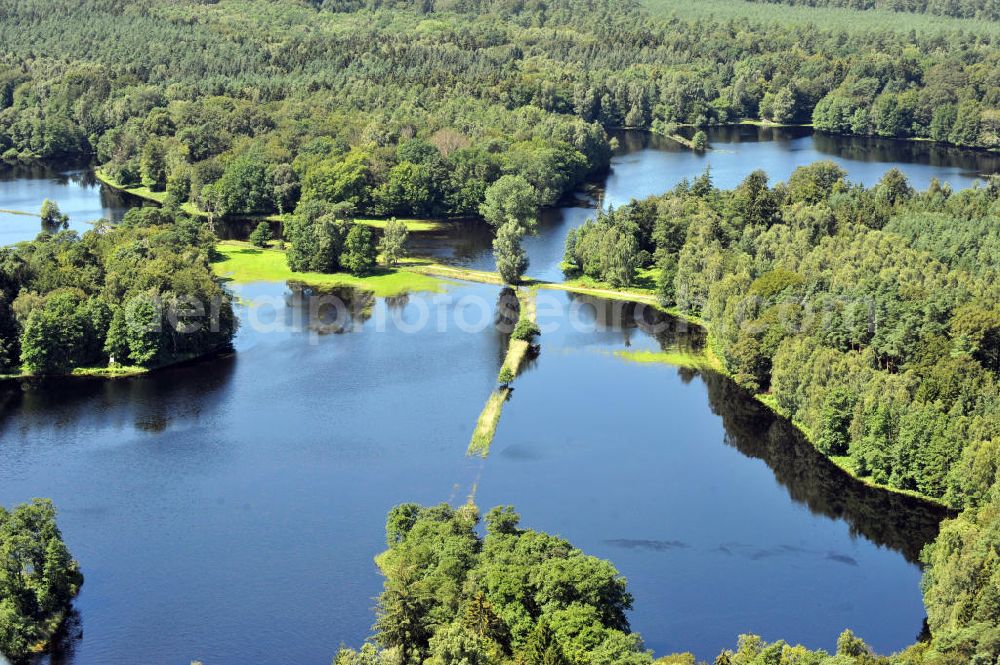 Aerial image Gelbensande - Der, durch überdurchschnittlichen Regen und Grundwassereinfluß überflutete, Gelbensan der Forst, ein küstennahes Waldgebiet mit Mooren und Torfstichen in Mecklenburg-Vorpommern. Flooded landscape conservation area Gelbensan der Forst in Mecklenburg-Western Pomerania.