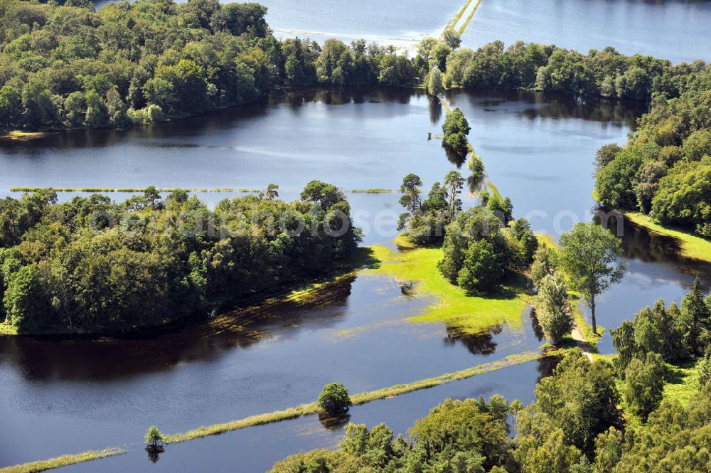 Aerial photograph Gelbensande - Der, durch überdurchschnittlichen Regen und Grundwassereinfluß überflutete, Gelbensan der Forst, ein küstennahes Waldgebiet mit Mooren und Torfstichen in Mecklenburg-Vorpommern. Flooded landscape conservation area Gelbensan der Forst in Mecklenburg-Western Pomerania.