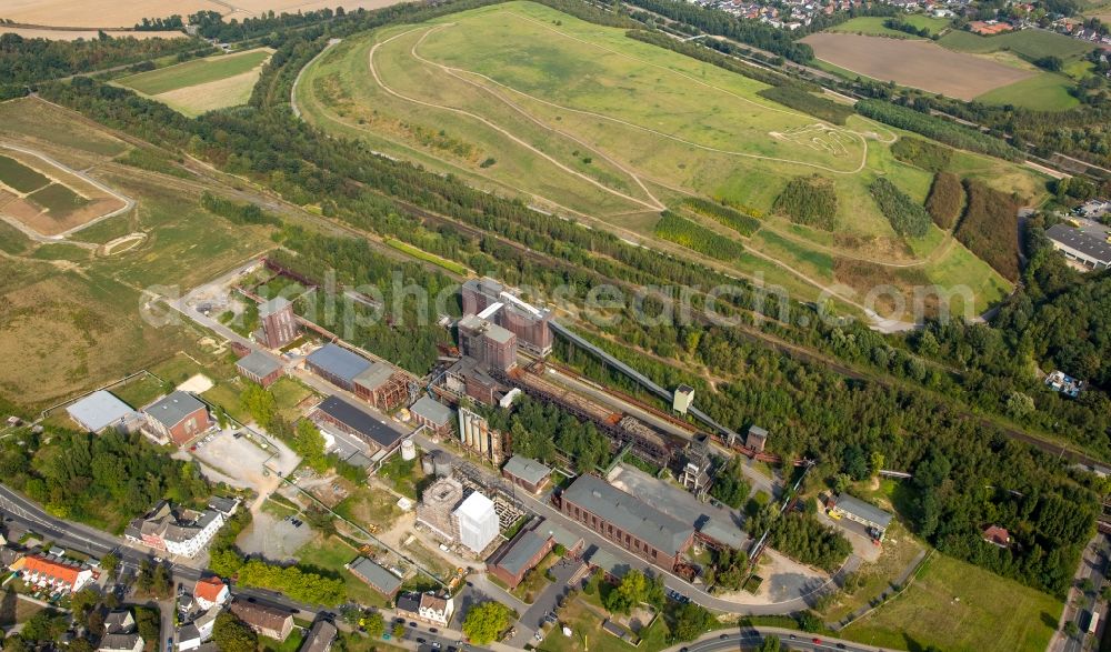 Aerial image Dortmund - Terrain with tailings and industrial monument of the Hansa coking plant in Dortmund-Huckarde in North Rhine-Westphalia. The museum Hansa coking plant includes extensive technical facilities such as the gasometer and the broken wooden cooling tower