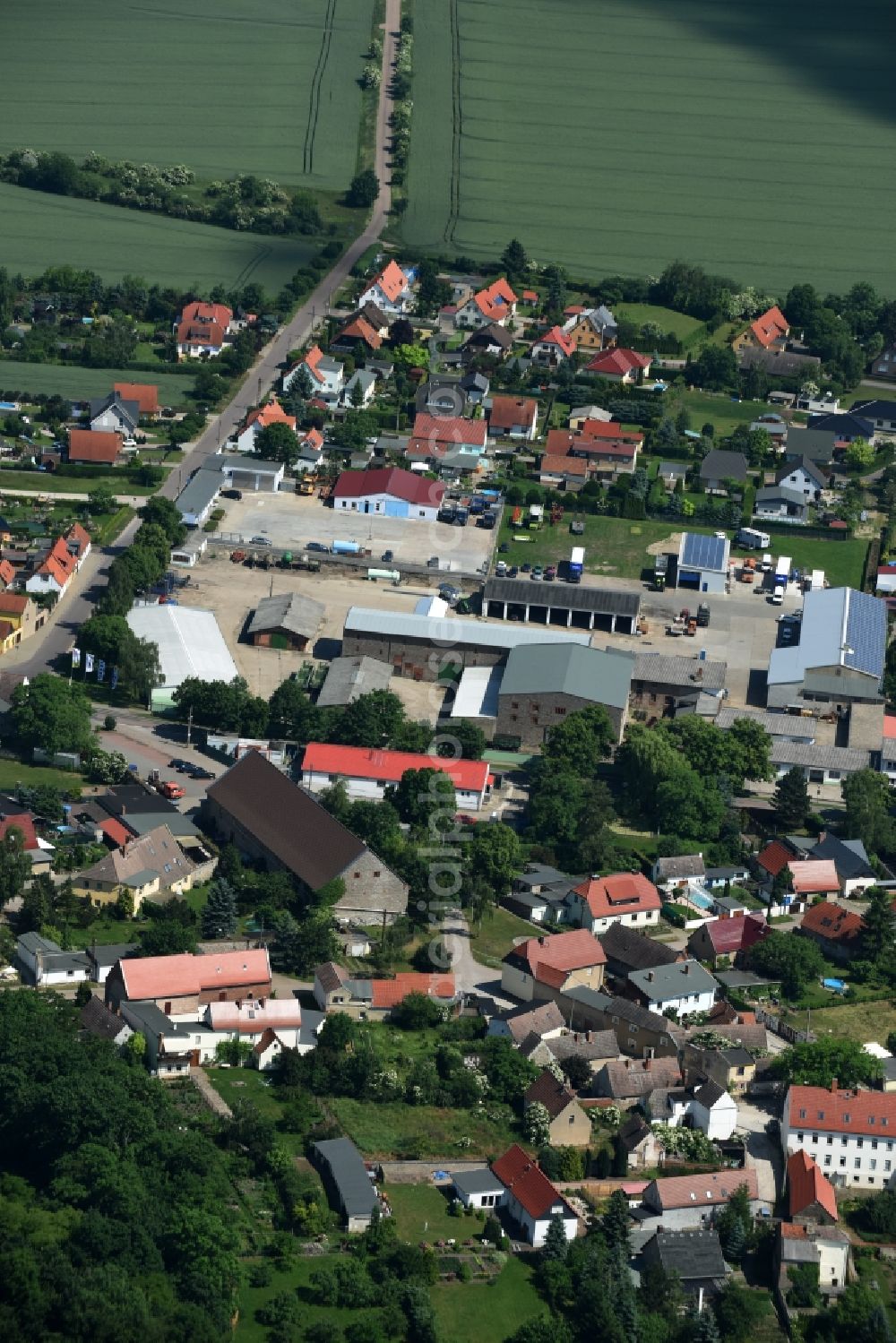 Aerial image Könnern - Buildings and halls on the premises of the Agrargenossenschaft e.G. Saaleaue Beesenlaublingen in Koennern in the state Saxony-Anhalt