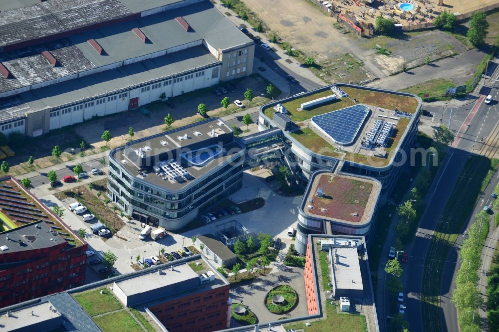 Aerial image Leipzig - Compound of the Alte Messe (Old Exhibition) in Leipzig in the state of Saxony. The distinct red building located on Perlickstrasse is the Bio Cube Leipzig and located next to the Old Messe Leipzig. It belongs to the complex of Bio City Leipzig and includes laboratories and offices. The large hall is the old exhibition centre, several shopping facilities and stores are located on site as well