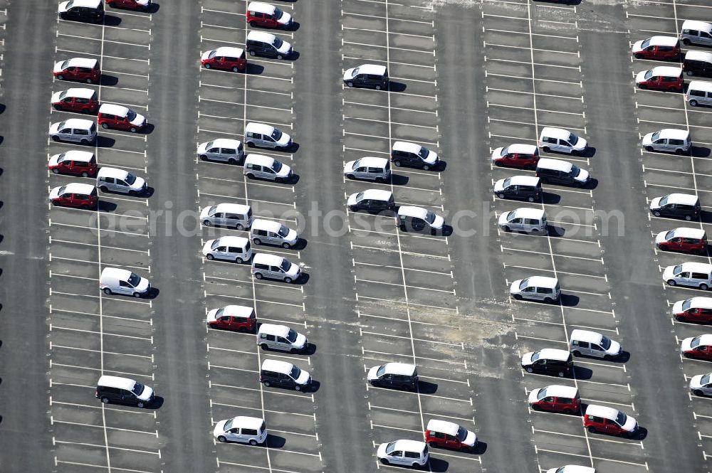 Aerial image Etzin - Gelände der Auto- Service-und Umschlag- Center Mosolf GmbH in Etzin bei Nauen. Die Firma besteht seit über 50 Jahren und bietet außer Logistikdienstleistungen, Kraftfahrzeugvermietung und -verkauf, ebenso Technik-, Prüfungs- und Ausstattungsdienste an. Site of the auto service center and transshipment Mosolf GmbH Etzin at Nauen. The company was founded over 50 years and in addition to logistics services, vehicle rental and sale, as well engineering, testing and equipment services.