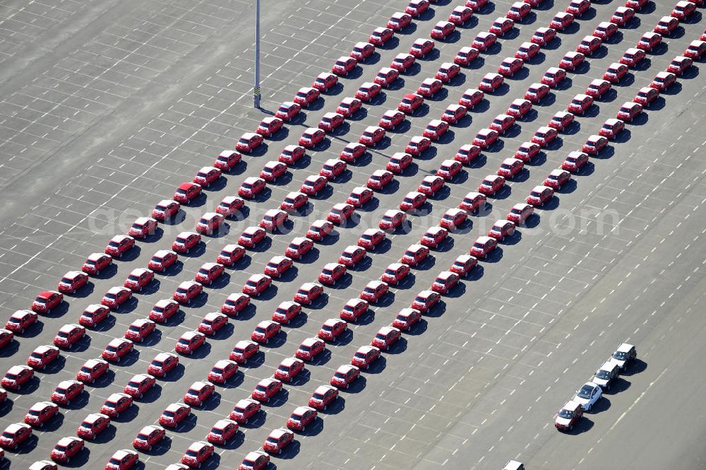 Aerial image Etzin - Gelände der Auto- Service-und Umschlag- Center Mosolf GmbH in Etzin bei Nauen. Die Firma besteht seit über 50 Jahren und bietet außer Logistikdienstleistungen, Kraftfahrzeugvermietung und -verkauf, ebenso Technik-, Prüfungs- und Ausstattungsdienste an. Site of the auto service center and transshipment Mosolf GmbH Etzin at Nauen. The company was founded over 50 years and in addition to logistics services, vehicle rental and sale, as well engineering, testing and equipment services.