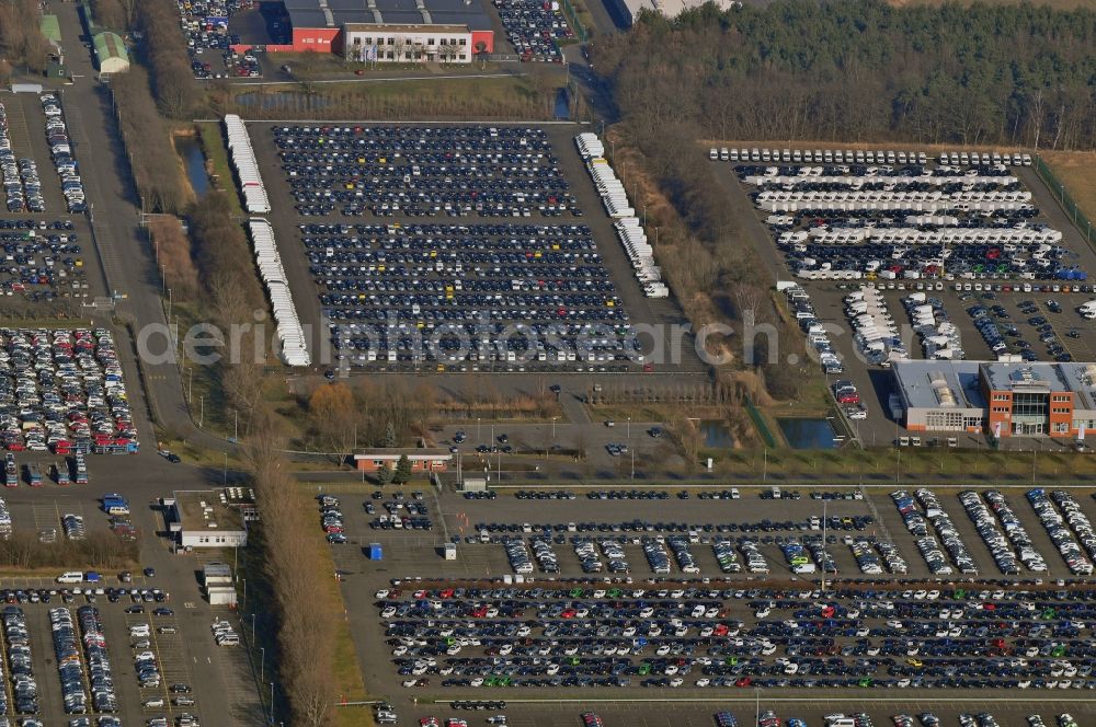 Aerial image Etzin - Site of the auto service center and transshipment Mosolf GmbH Etzin at Nauen. The company was founded over 50 years and in addition to logistics services, vehicle rental and sale, as well engineering, testing and equipment services