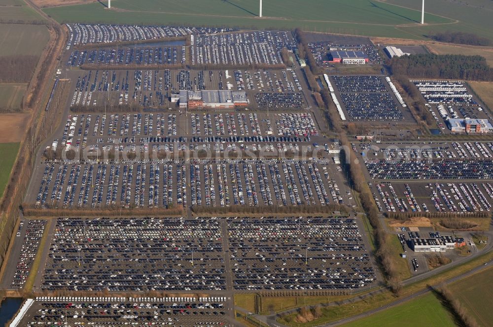 Aerial photograph Etzin - Site of the auto service center and transshipment Mosolf GmbH Etzin at Nauen. The company was founded over 50 years and in addition to logistics services, vehicle rental and sale, as well engineering, testing and equipment services