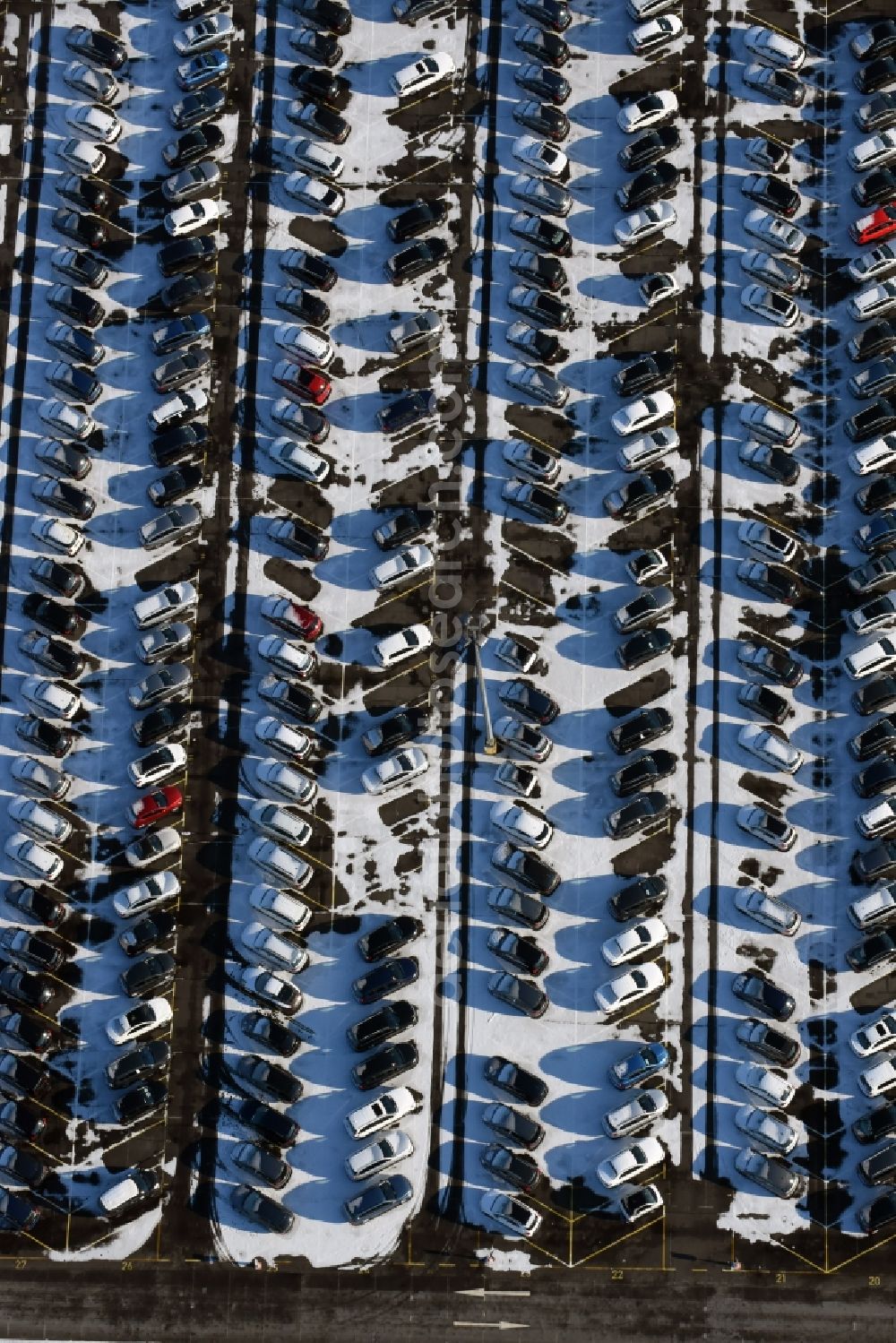 Aerial image Ketzin - Wintry snowy site of the auto service center and transshipment Mosolf GmbH Etzin. The company in addition to logistics services, vehicle rental and sale, as well engineering, testing and equipment services