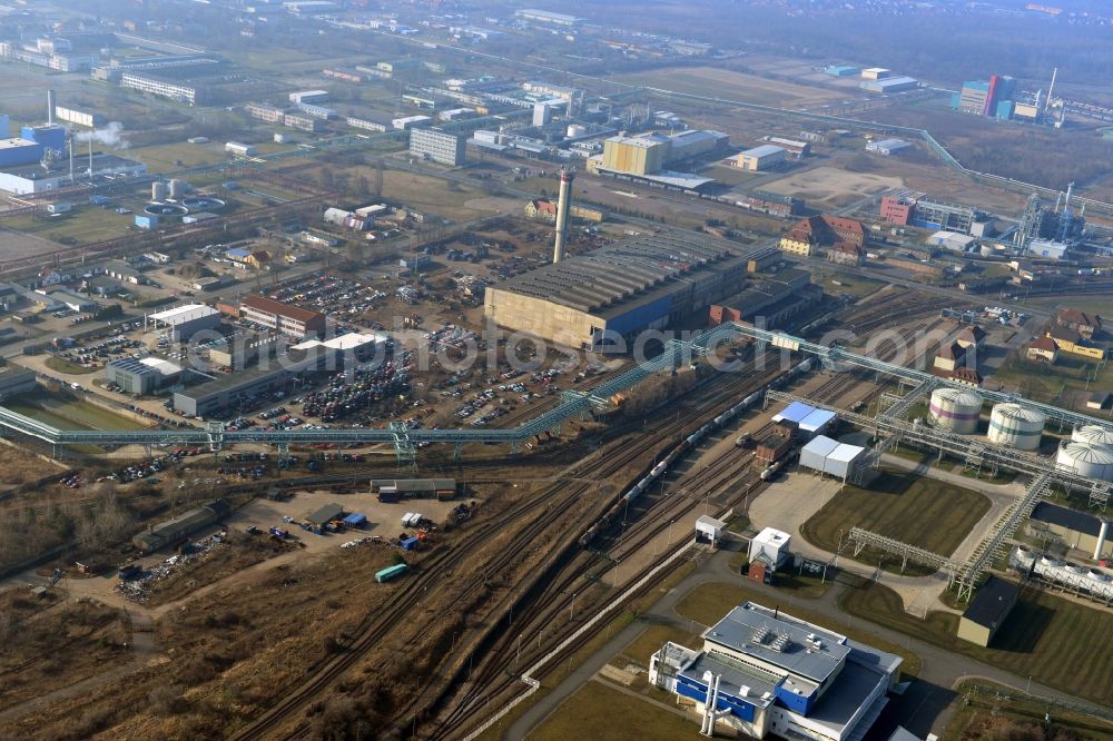 Aerial image Bitterfeld-Wolfen - On the site of Car Recycling BAREC GmbH in Bitterfeld-Wolfen in the state of Saxony-Anhalt old cars and damaged cars are environmentally friendly recycled and disposed of. Recycling is the main objective of the company. To service the company continues to include used cars and spare parts trade, motor vehicle repair and accident recovery