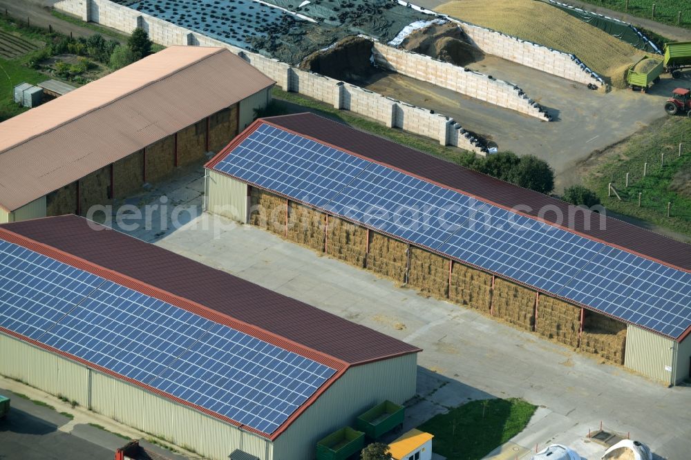 Aerial image Zschepplin - Farm and agricultural estate on the edge of Zschepplin in the state of Saxony. The compound with its halls and agricultural facilities is located in the North of the borough