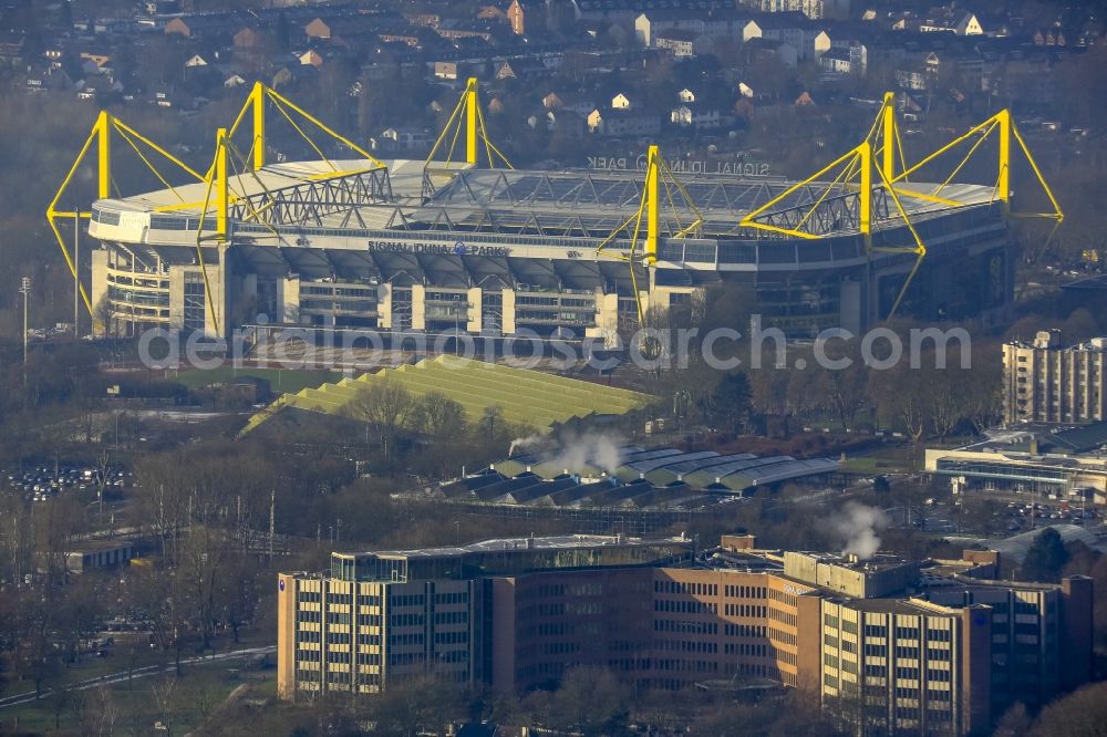 Dortmund from the bird's eye view: View of the Borusseum, the Signal Iduna Park stadium of Borussia Dortmund in North Rhine-Westphalia. In the foreground the office and administration buildings of the insurance company Signal Iduna