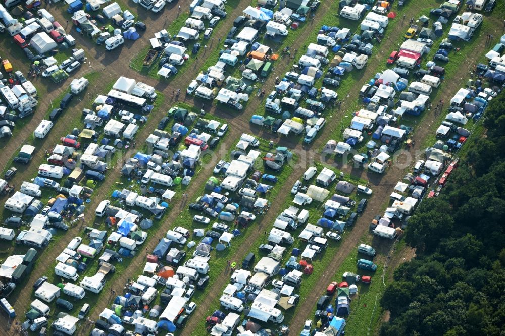 Nordholz from above - Participants in the Deichbrand Festival music festival on the event concert area in Nordholz in the state Lower Saxony, Germany