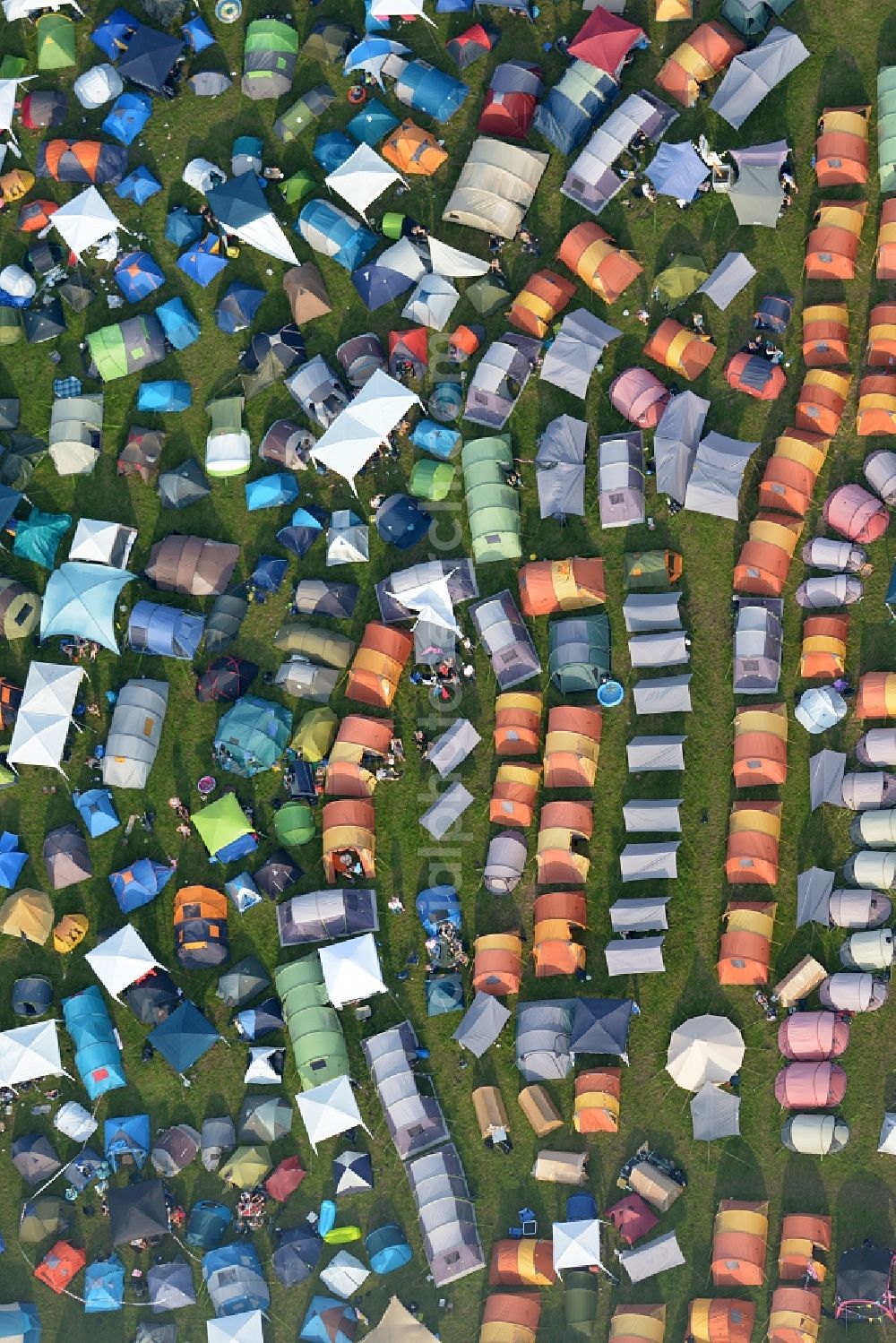 Nordholz from the bird's eye view: Participants in the Deichbrand Festival music festival on the event concert area in Nordholz in the state Lower Saxony, Germany