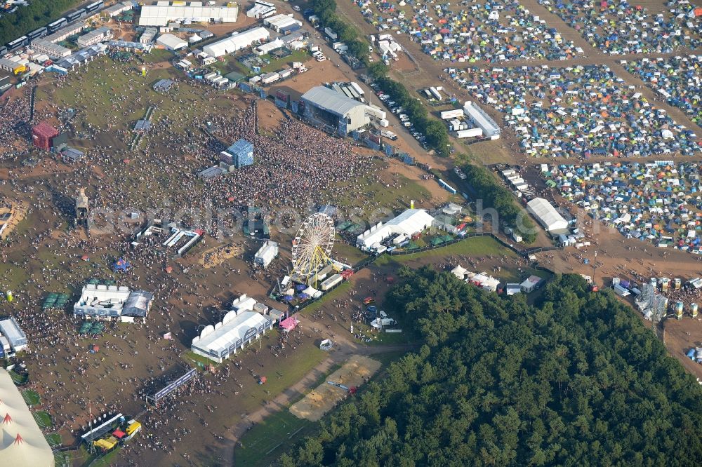 Nordholz from the bird's eye view: Participants in the Deichbrand Festival music festival on the event concert area in Nordholz in the state Lower Saxony, Germany