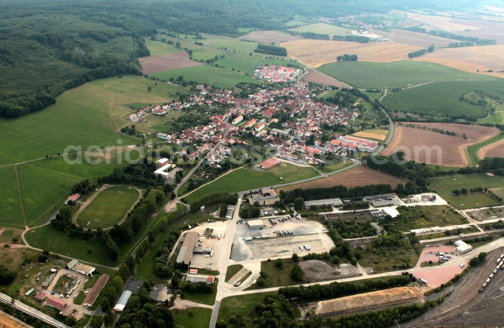 Aerial photograph Deuna - View over cement plant area of the Deuna Zement company to the municipality Deuna in Thuringia